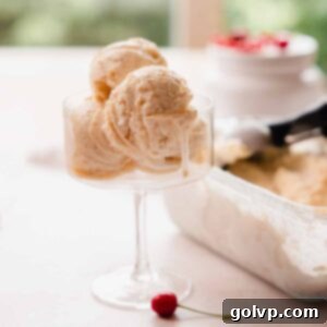 close up of ice cream scoops sitting in an ice cream glass