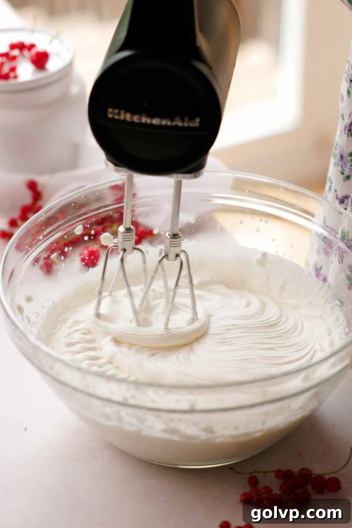 Nutty Brown Butter Ice Cream 8 Whipping heavy cream to stiff peaks in a glass bowl using an electric mixer.