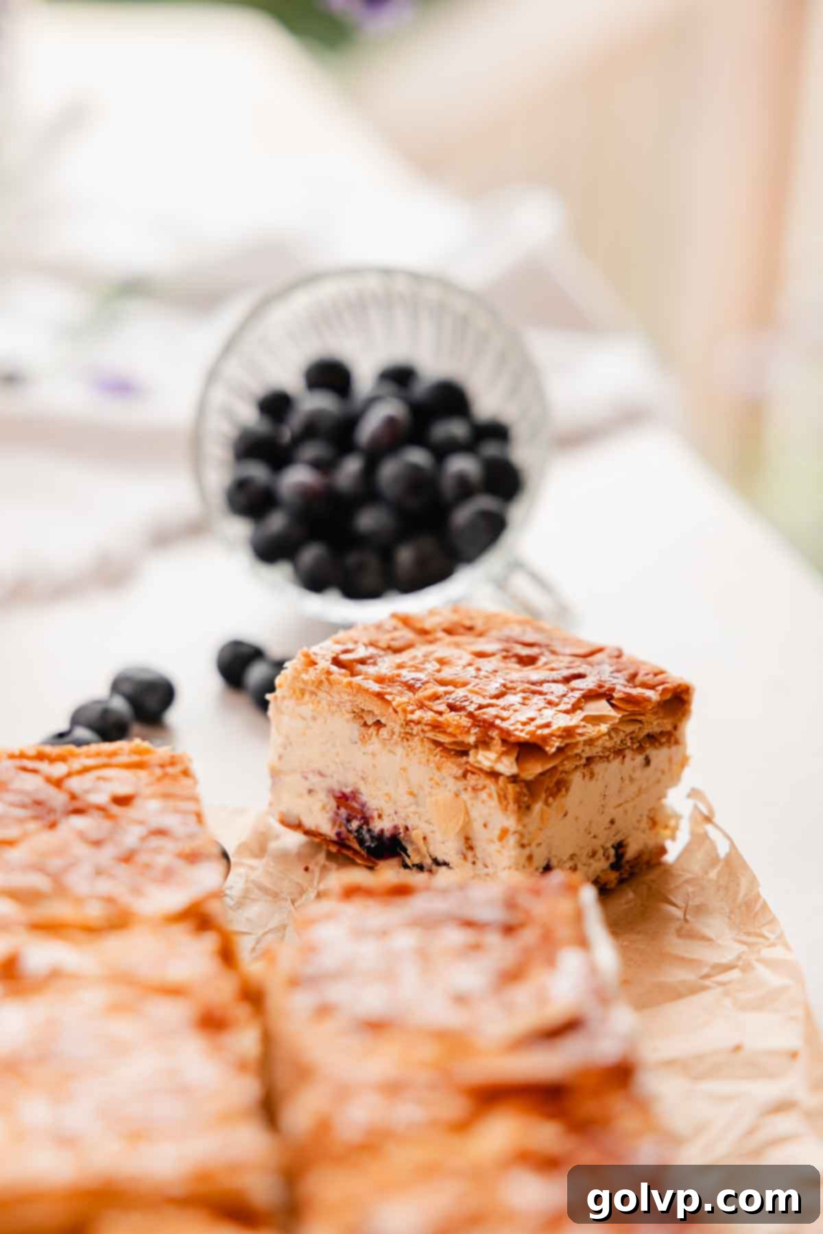 a single napoleon ice cream sandwich on a piece of parchment paper