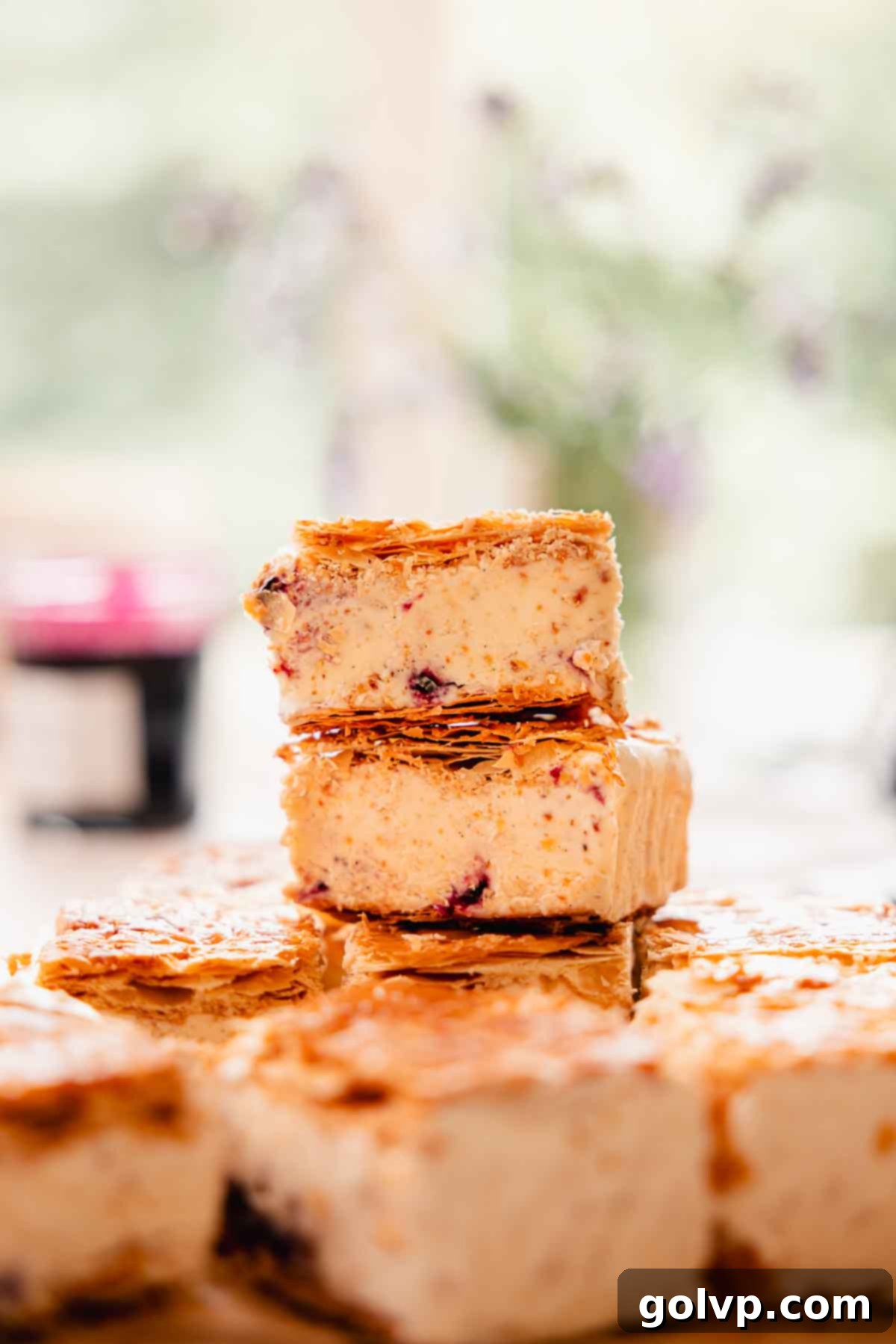 stacked homemade puff pastry ice cream sandwiches with blueberry swirls
