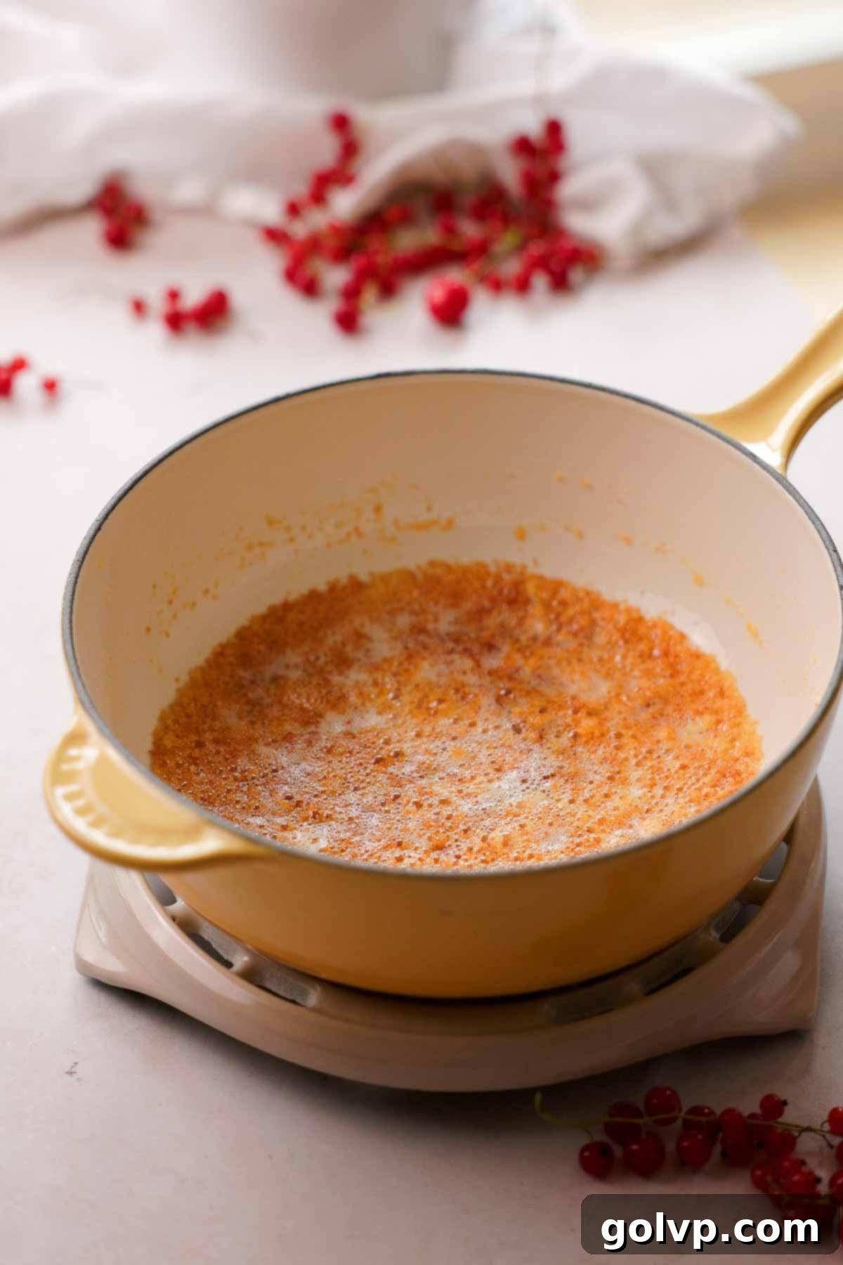 brown butter sizzling in a hot pot with vanilla bean