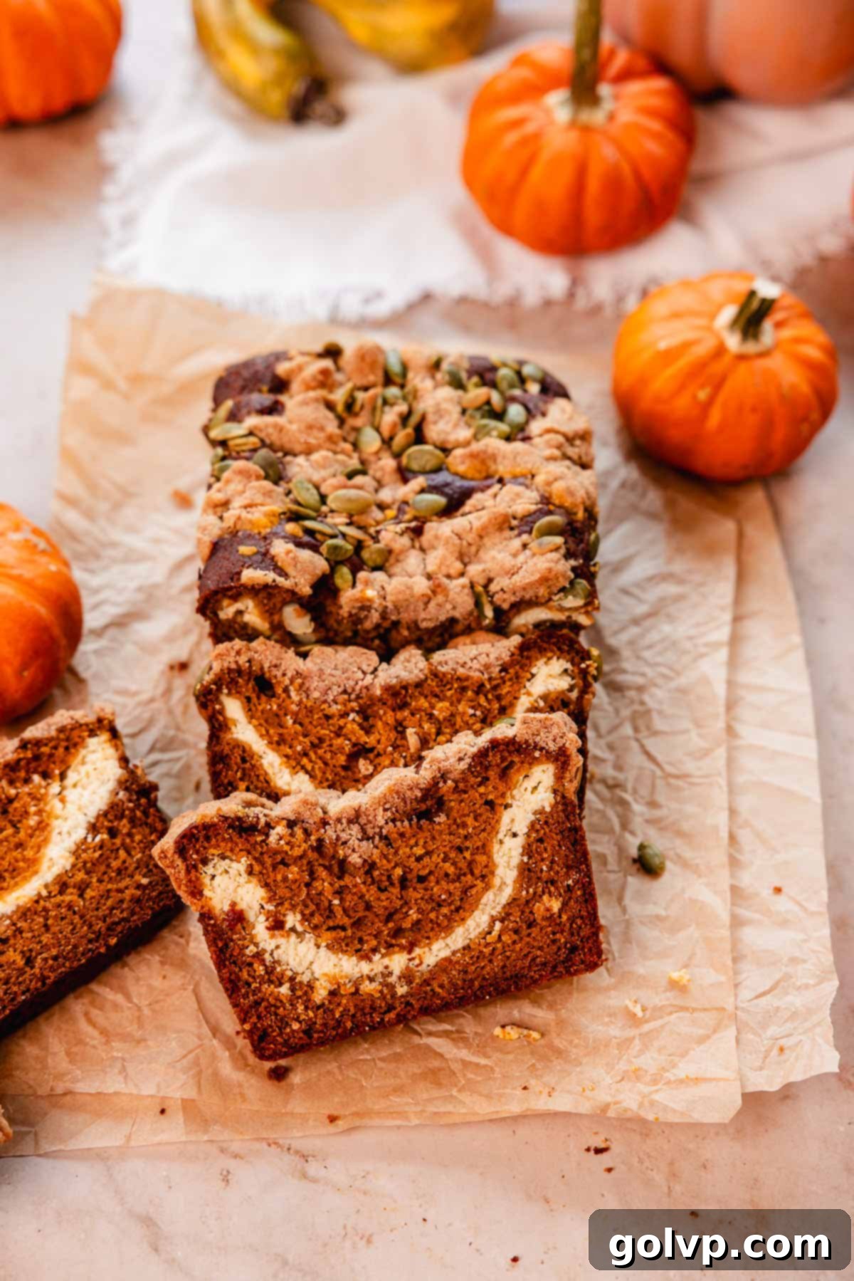 Autumn Pumpkin Streusel Cream Cheese Delight 2 pumpkin cream cheese bread with pumpkin seed streusel topping