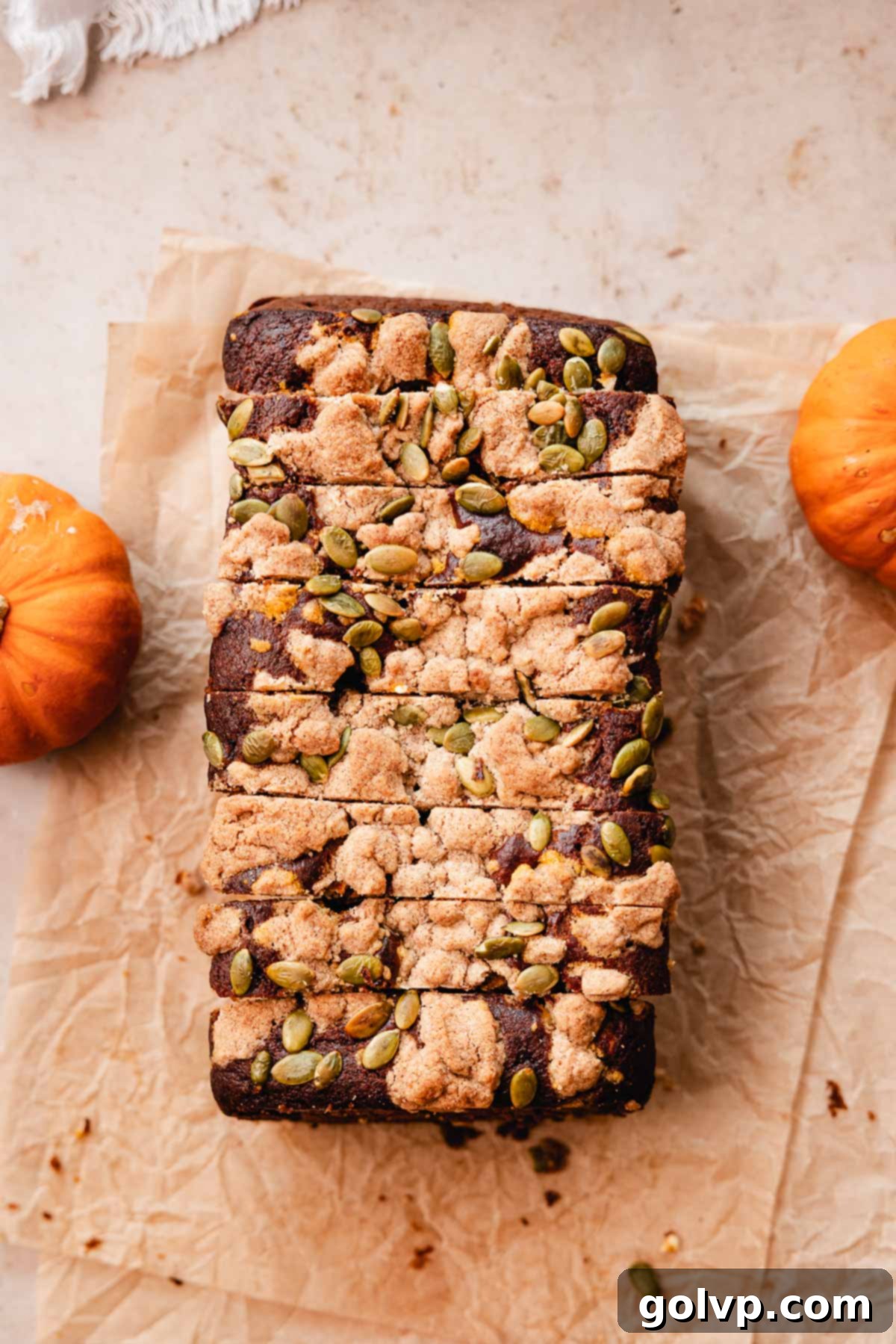 Autumn Pumpkin Streusel Cream Cheese Delight 16 sliced pumpkin bread loaf with streusel pumpkin seed topping