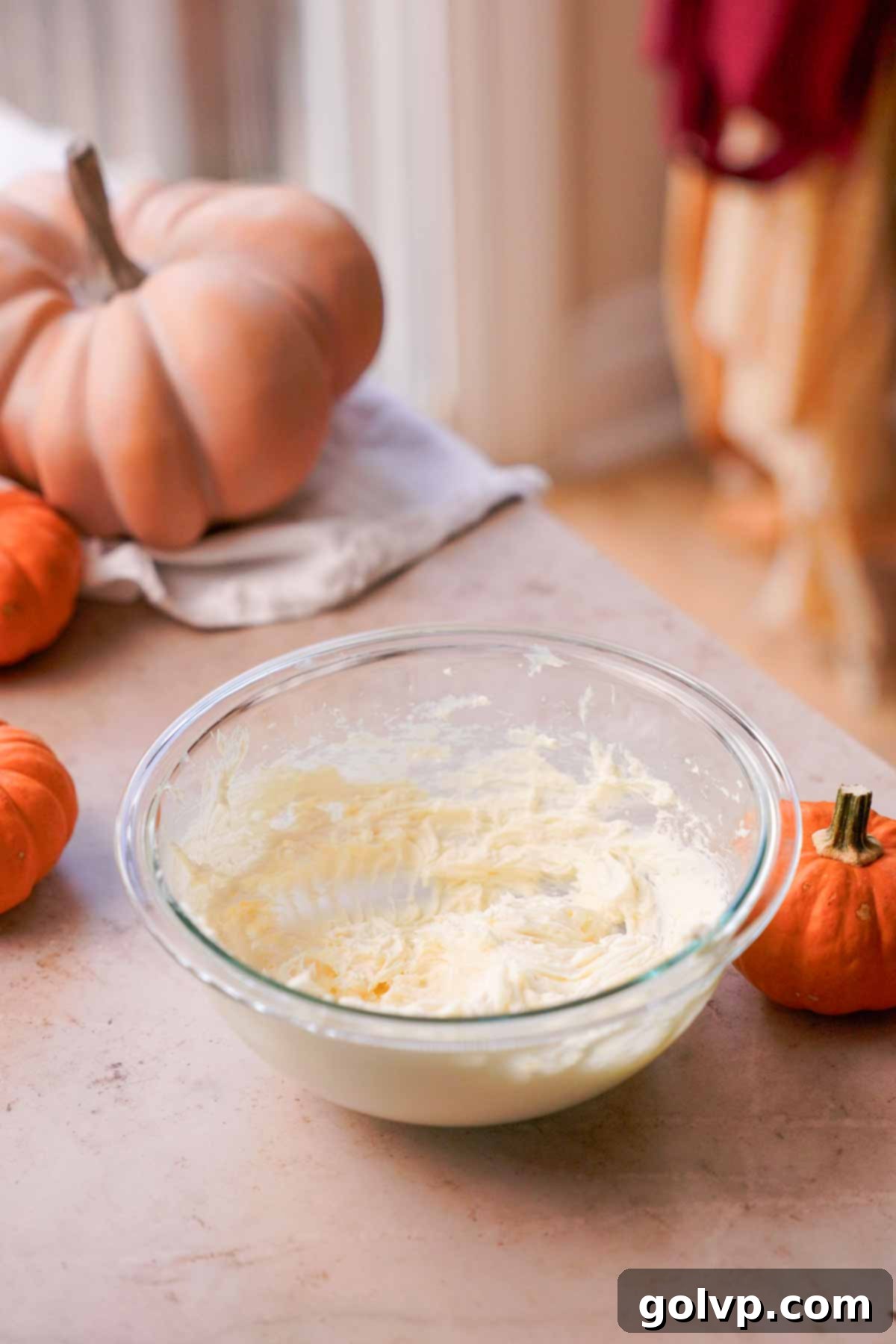 Autumn Pumpkin Streusel Cream Cheese Delight 8 cream cheese and sugar mixed in glass bowl