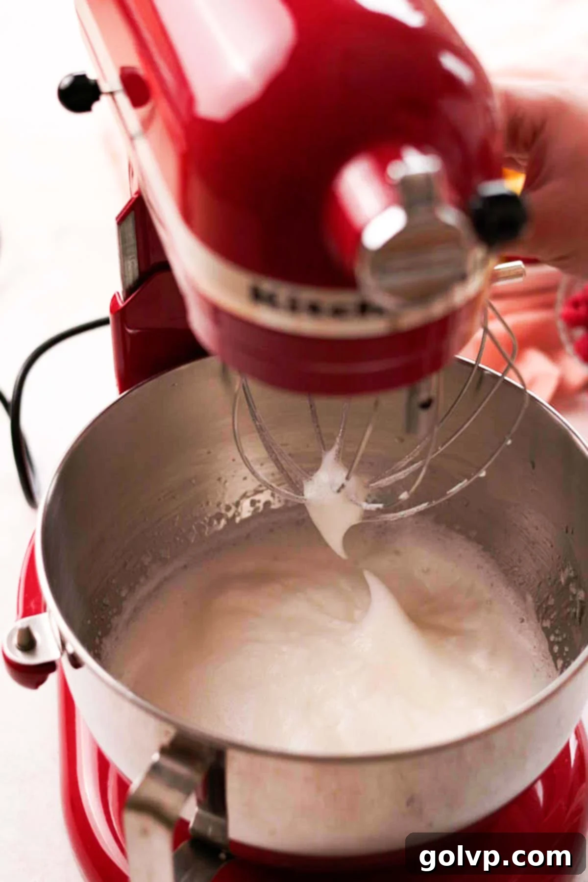 whisked egg whites to medium peaks in stand mixer