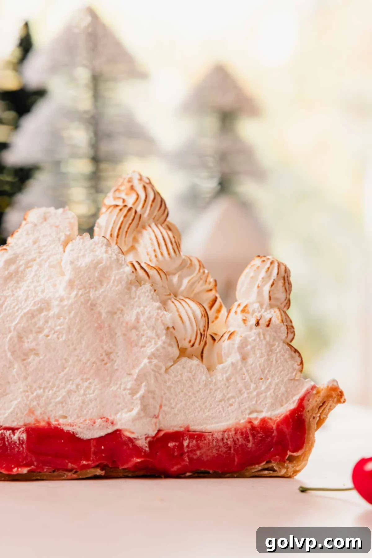 half a cherry meringue pie with mile high meringue