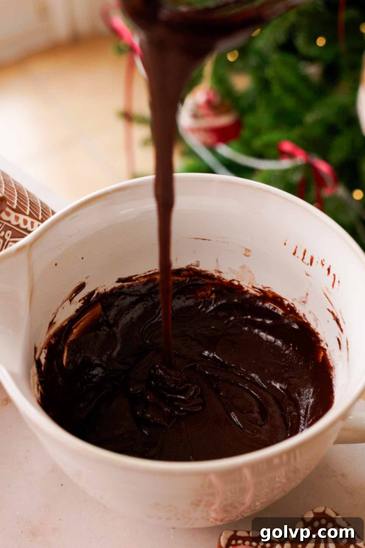 brownie batter falling off a whisk