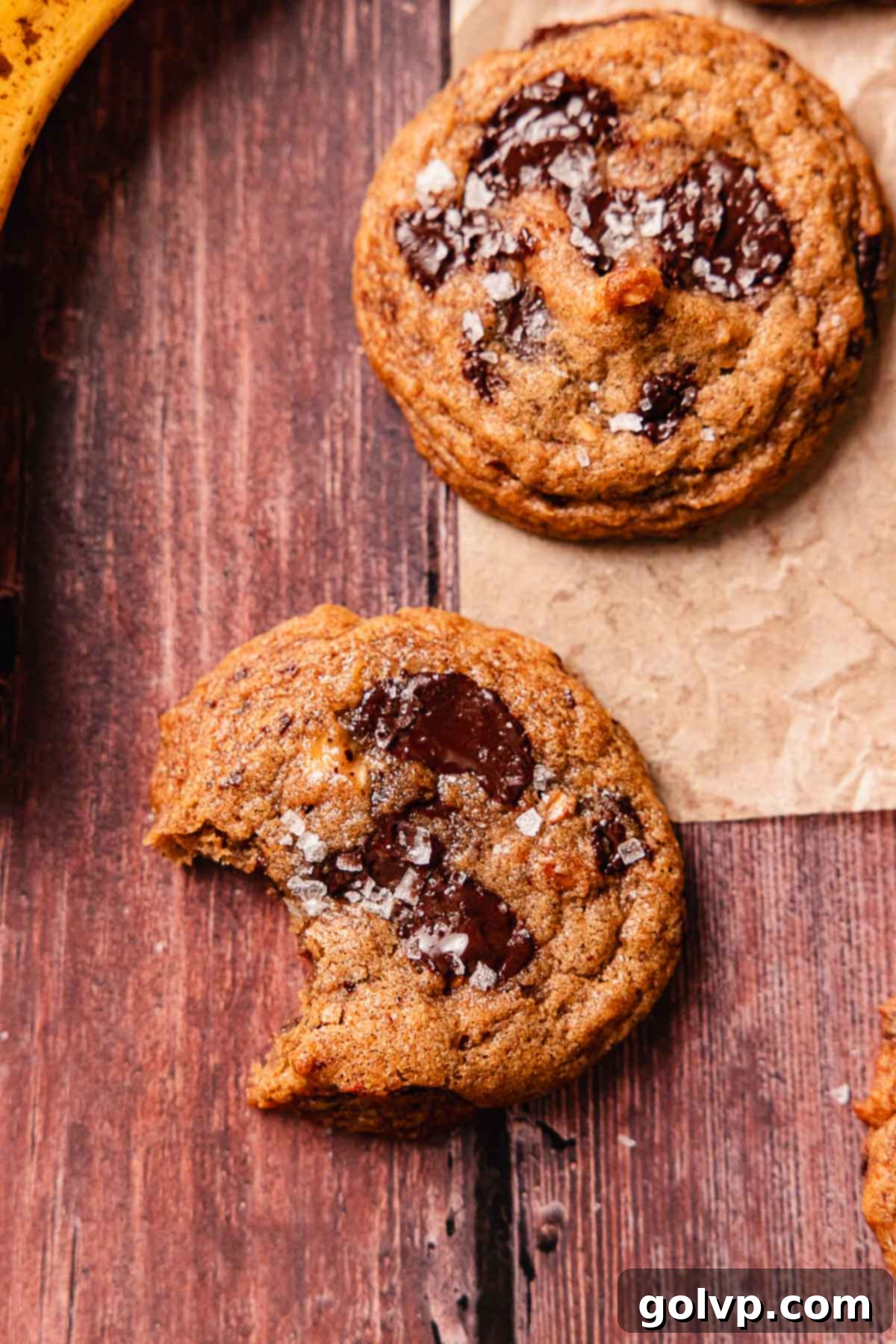 Soft-Baked Banana Bread Cookies 13 bitten crispy banana bread cookie on wooden table
