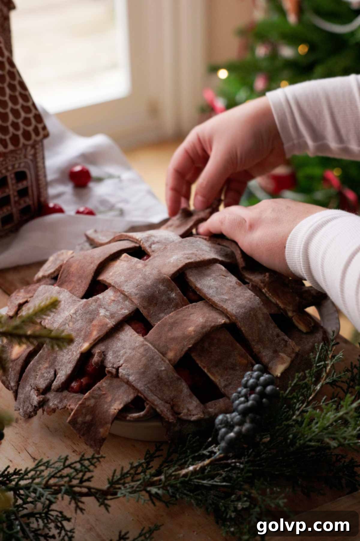 Decadent Chocolate Cherry Black Forest Pie 8 arranging chocolate pie crust lattice on top of cherry pie
