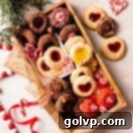Holiday Cookie Delights 2024 12 Christmas thumbprint cookie box, featuring various flavors of thumbprint cookies