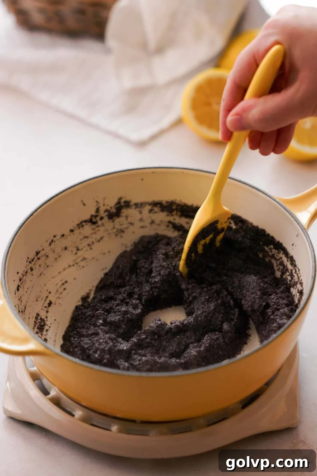 Lemon Poppy Seed Cheesecake Perfection 8 stirring cooked and thickened poppy seed paste in saucepan