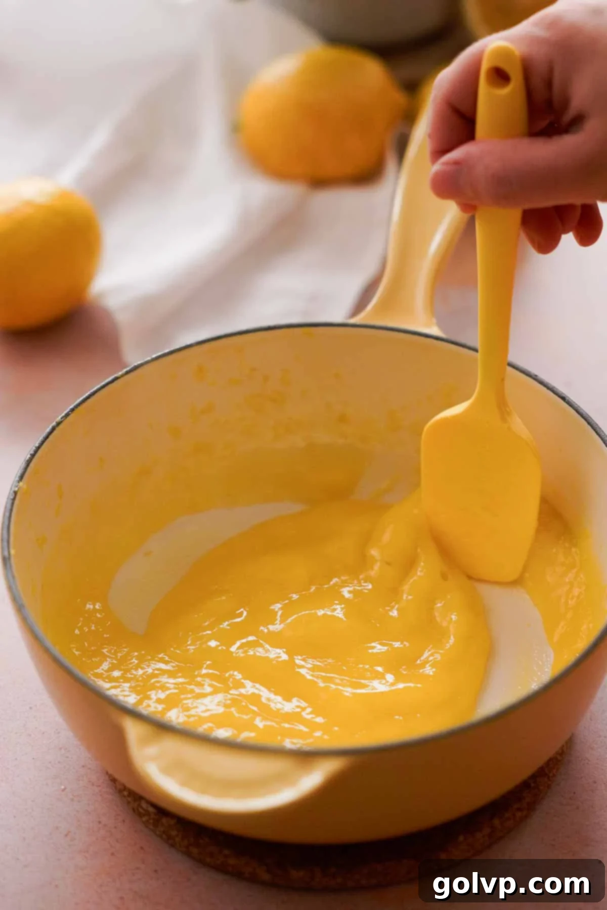 cooked lemon curd in small saucepan
