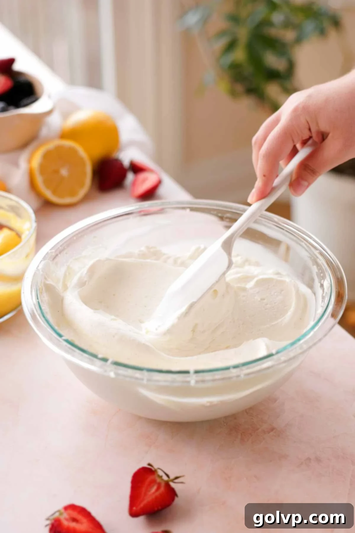whipped cream in glass bowl