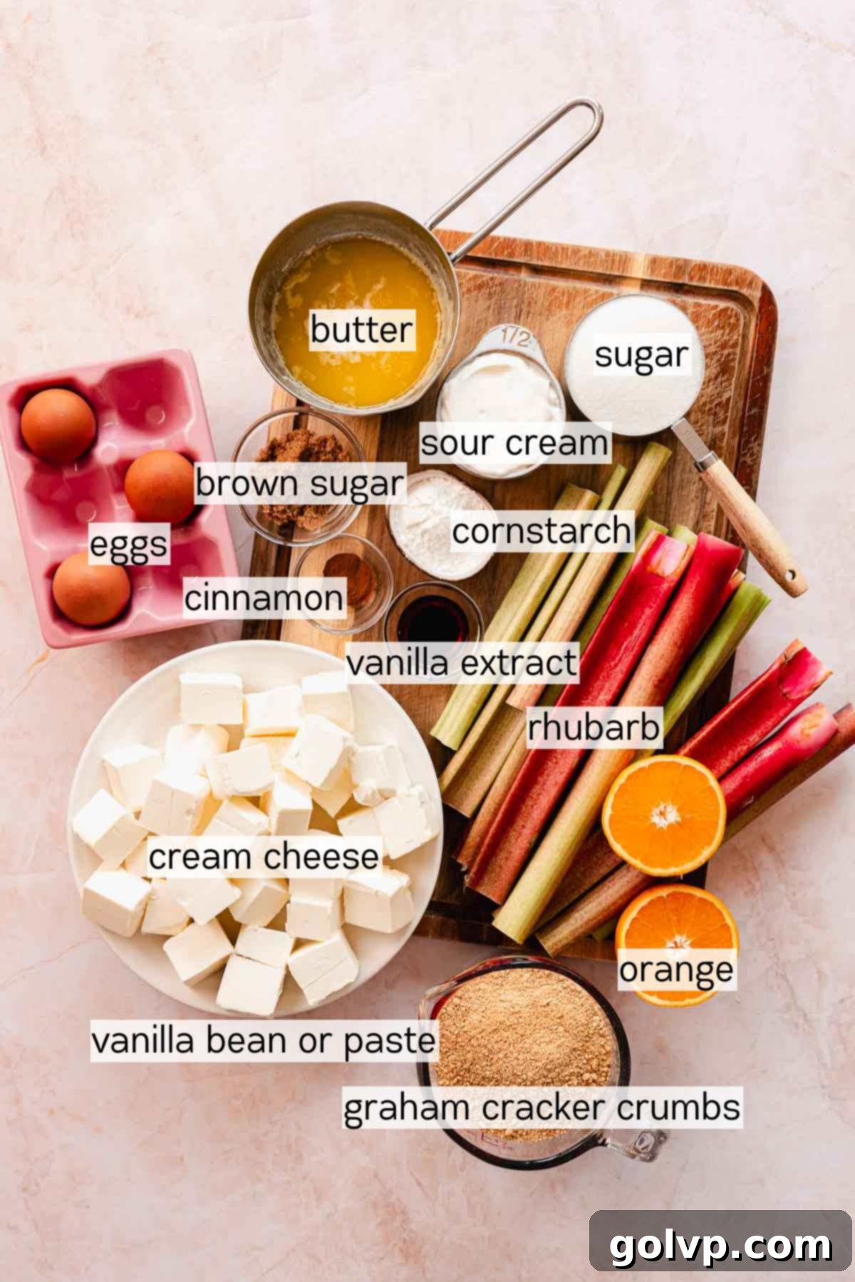 ingredients for rhubarb cheesecake in bowls