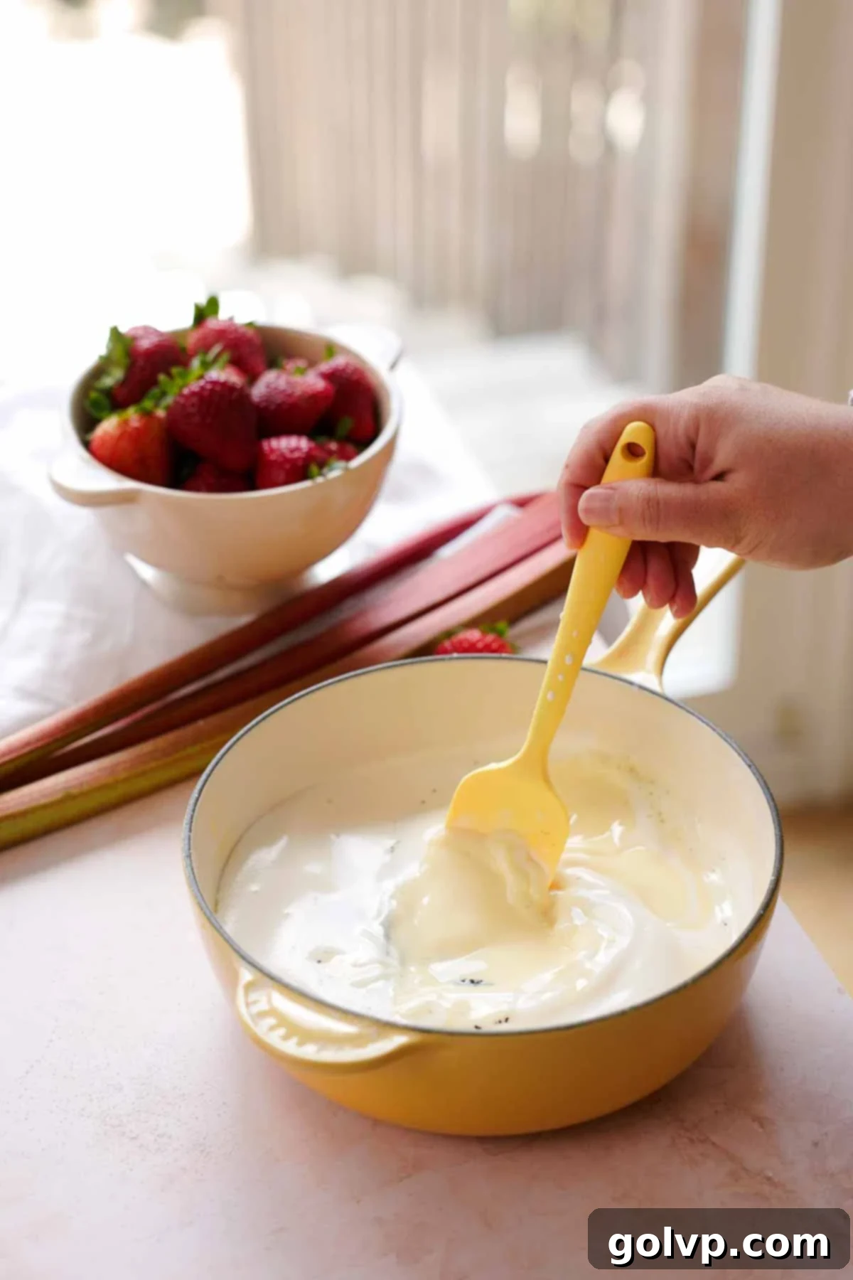 stirring uncooked custard ingredients together