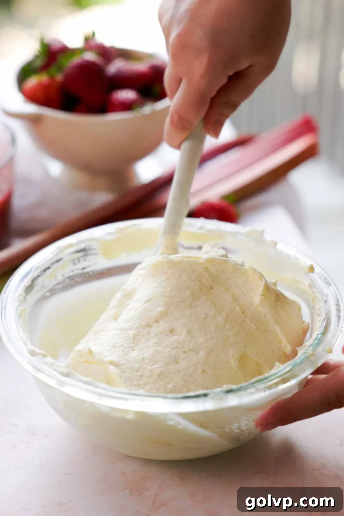 folding whipped cream into custard