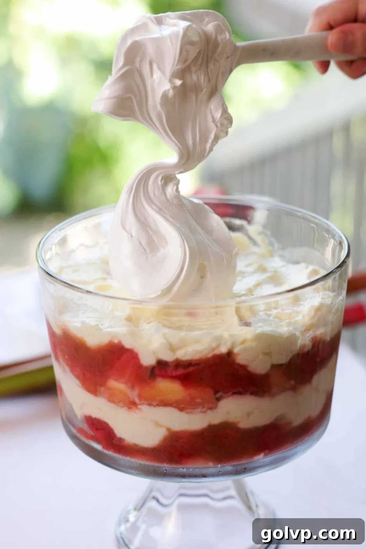 scooping meringue onto trifle