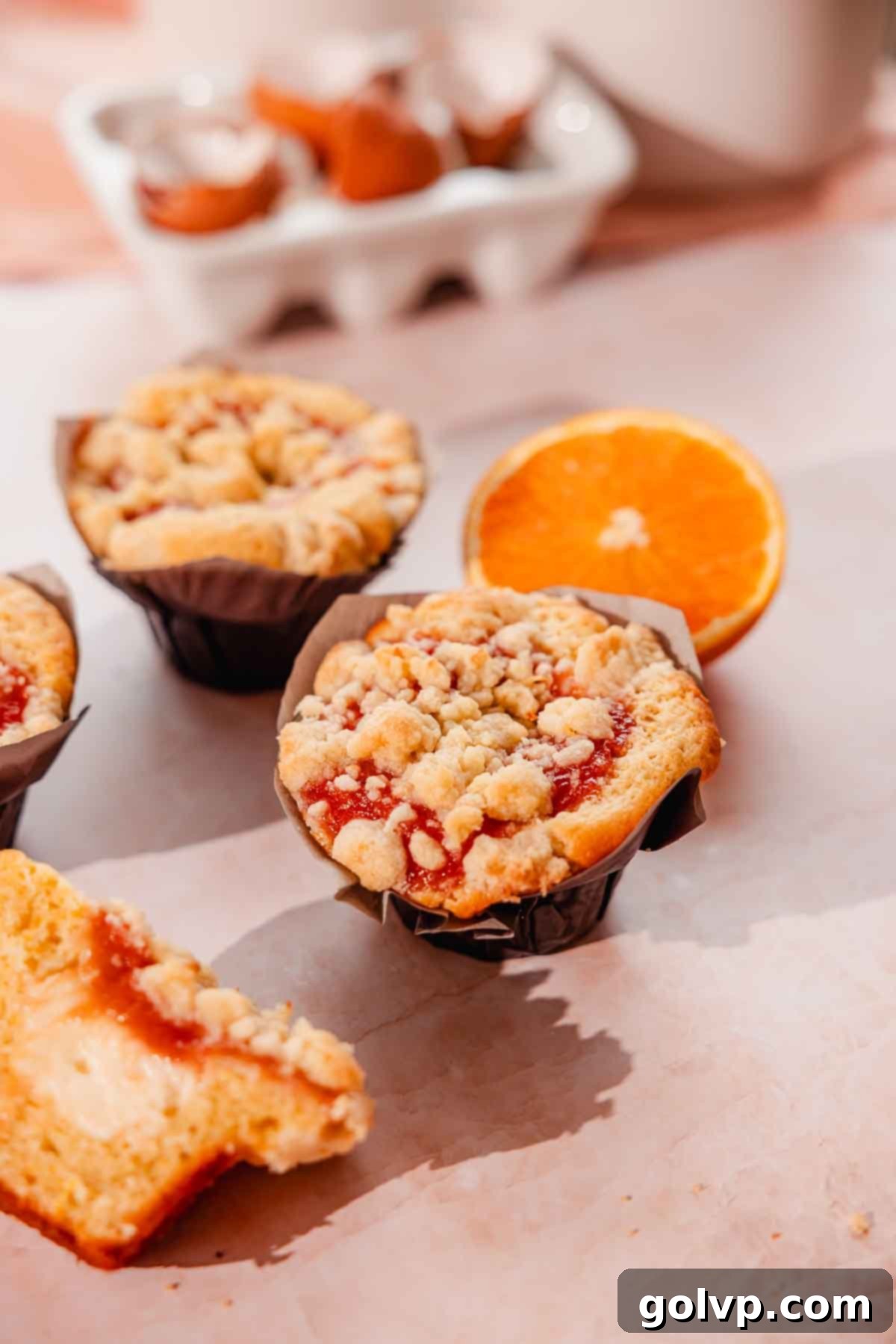 rhubarb orange muffin with rhubarb filling and crumble