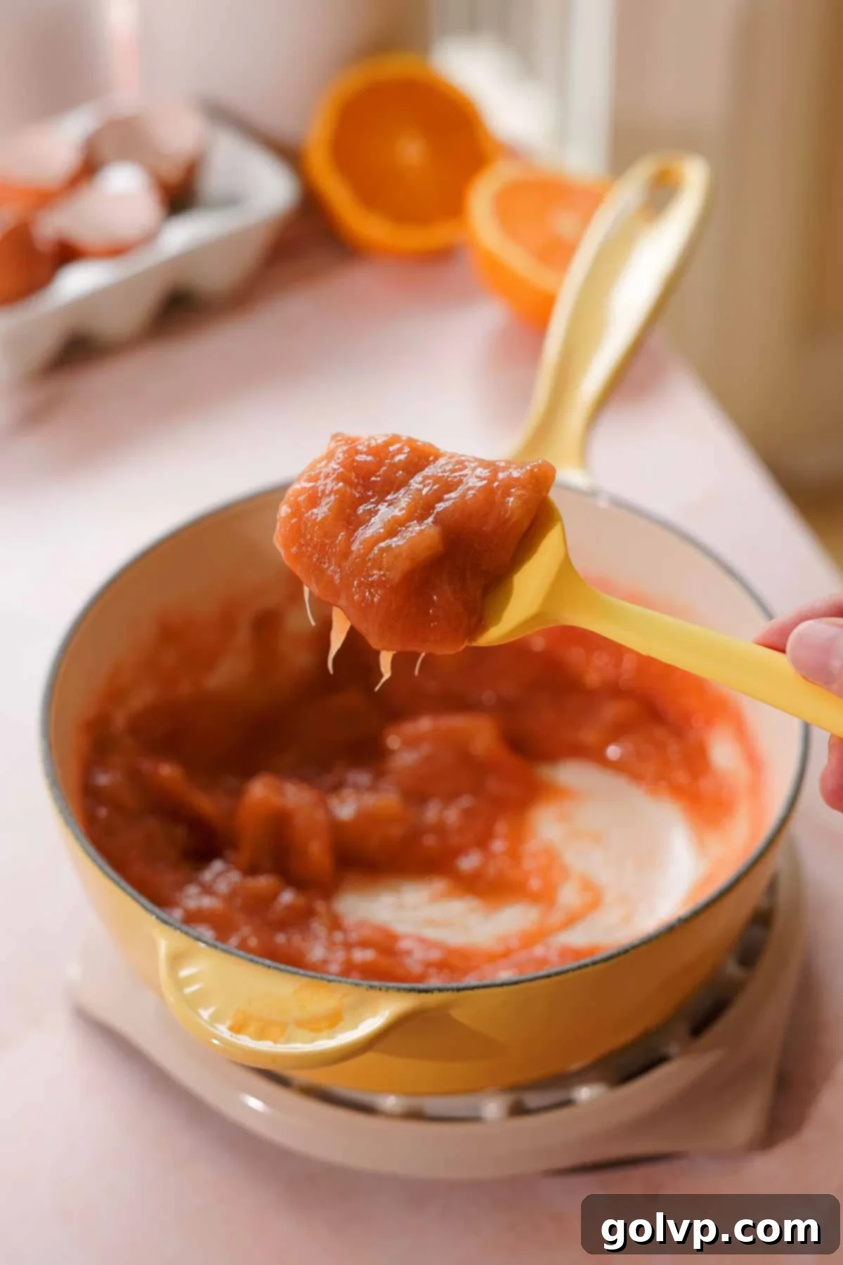 cooked rhubarb muffin filling on spatula