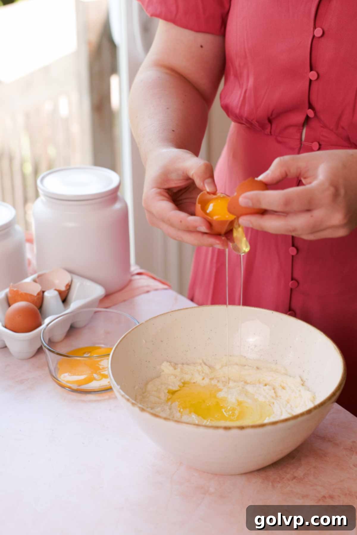 separating egg whites into the coconut cake batter