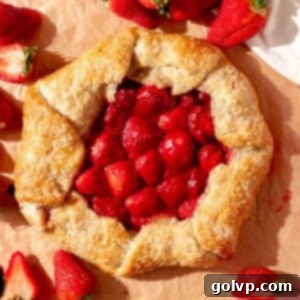 galette with strawberry filling and surrounded by fresh strawberries