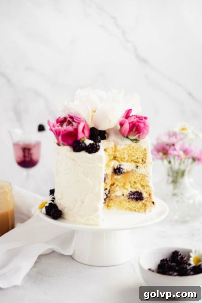 cut open cake with oozing caramel and peonies
