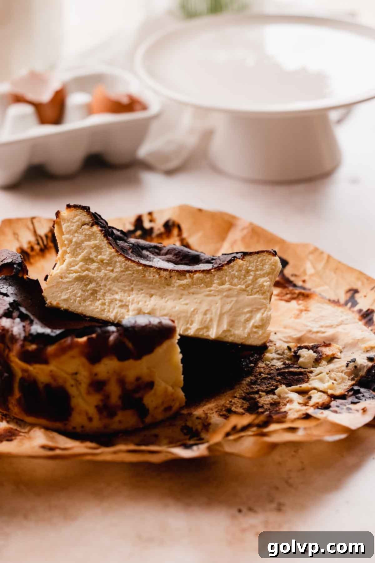 creamy basque burnt cheesecake cut in half