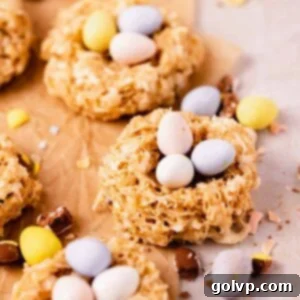 birds nest cookies on parchment paper with speckled mini eggs