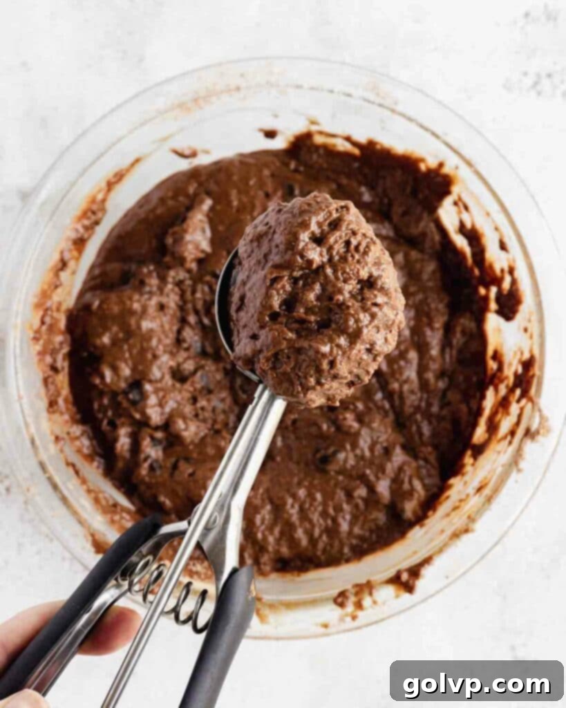 mixed double chocolate batter in a bowl, showing its thick consistency