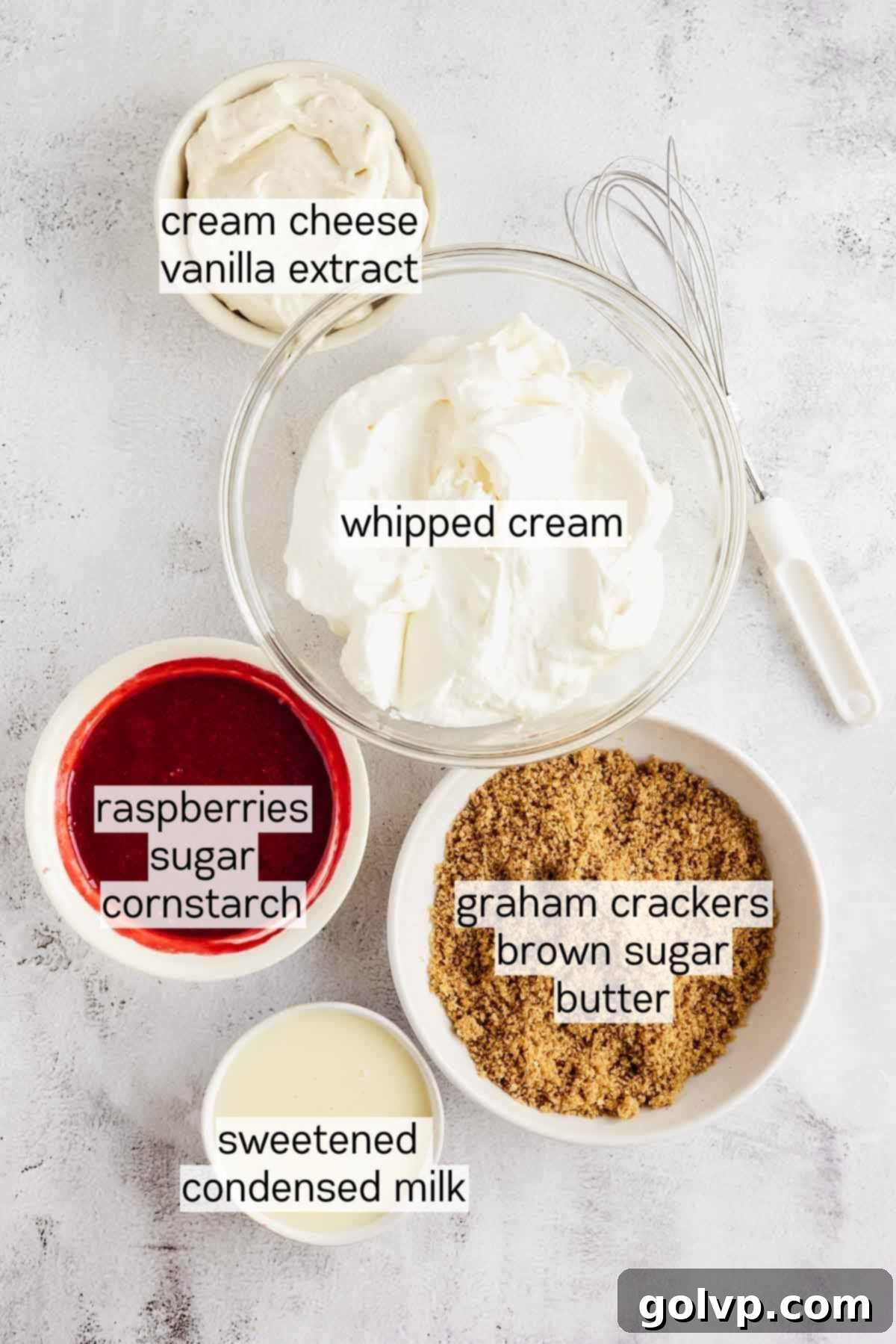 Close-up of raspberry cheesecake ice cream served in elegant bowls, showing swirls and textures