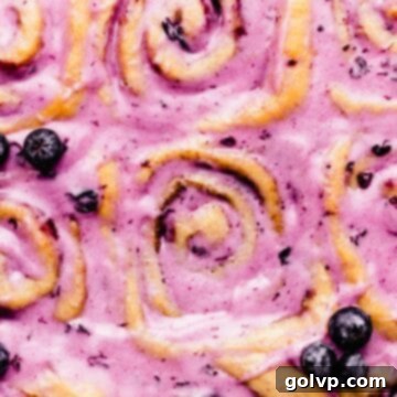 Gooey blueberry cinnamon rolls with luscious blueberry cream cheese glaze