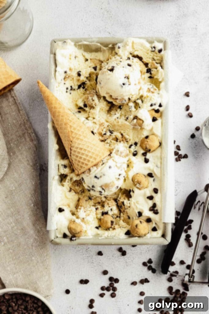 Various ingredients for no-churn ice cream, including a jar of edible cookie dough
