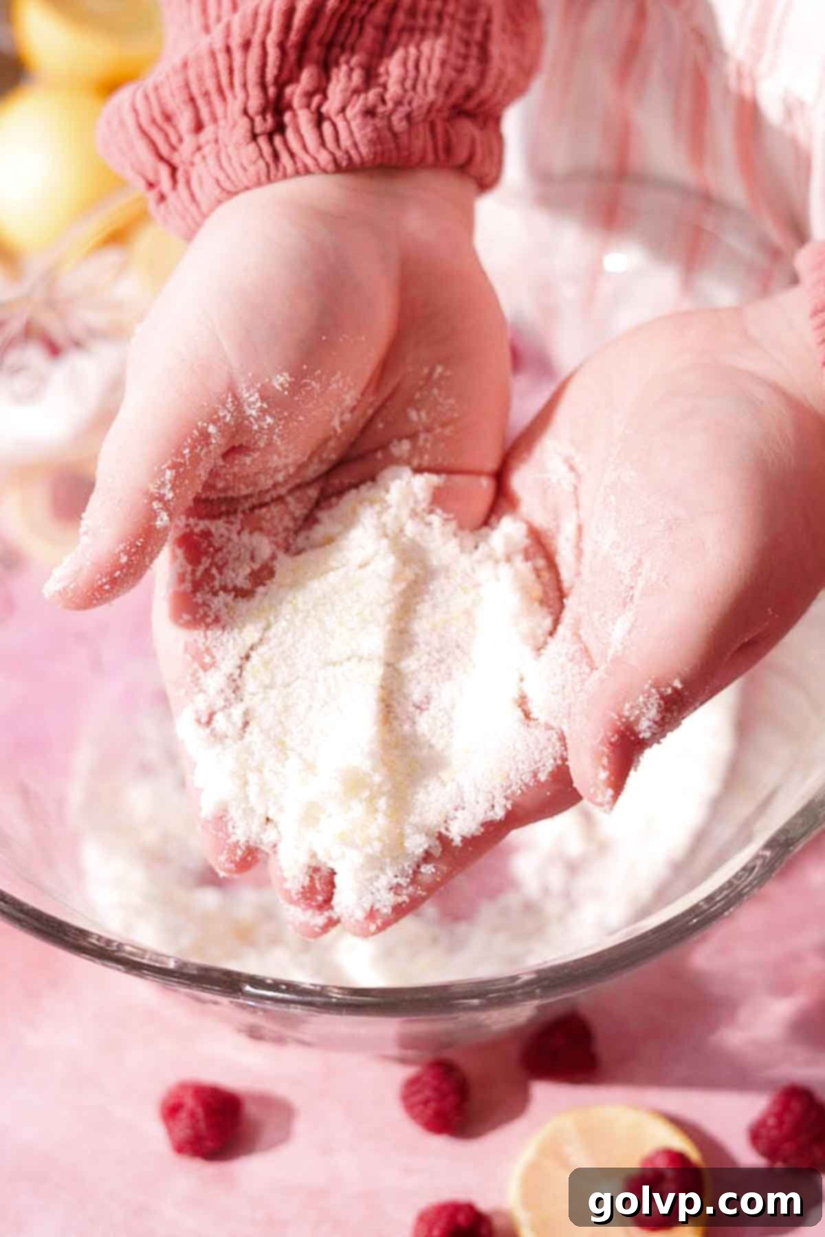 rubbing sugar and lemon zest with hands until sandy and fragrant