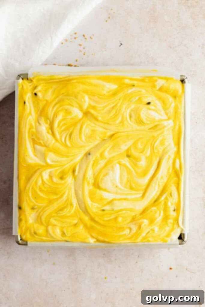 A full cheesecake with passion fruit curd swirls.