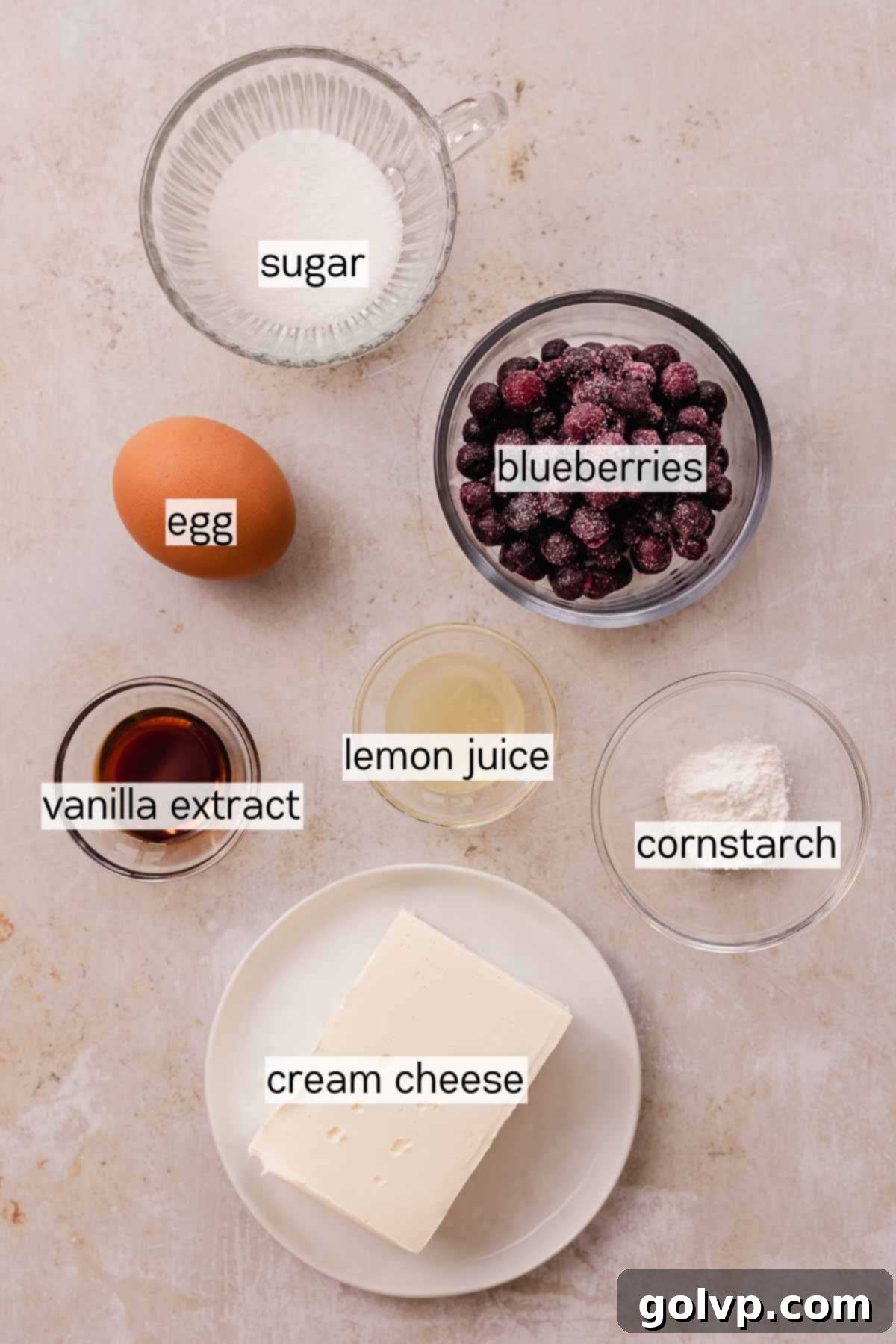 ingredients for blueberry cream cheese cookie filling in bowls