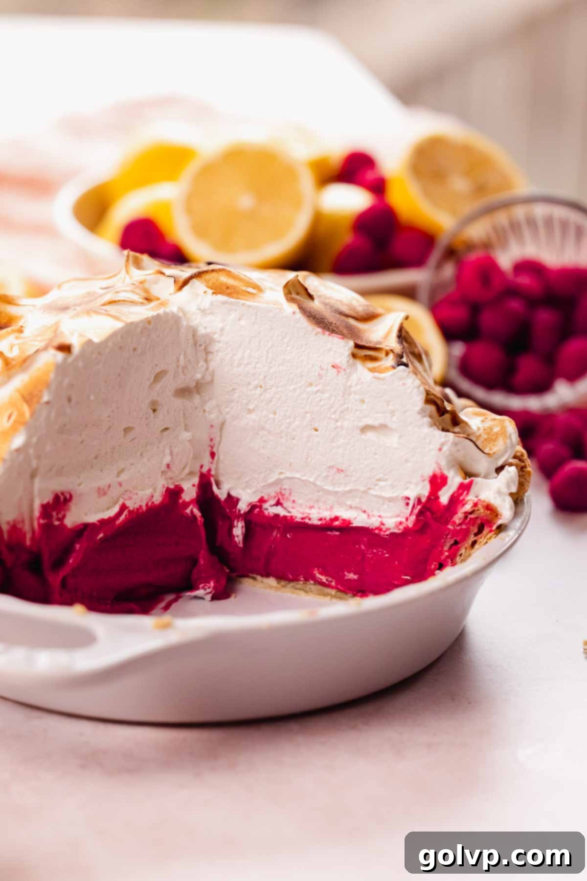 raspberry meringue pie in pie plate