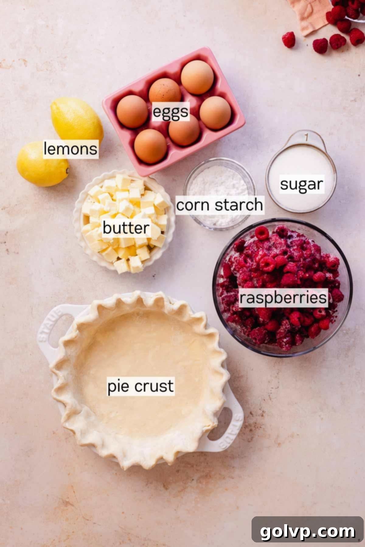 ingredients for raspberry meringue pie in bowls