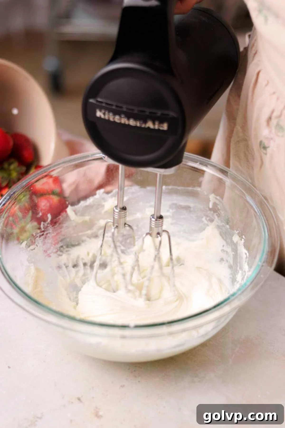 Fresh Strawberry Cinnamon Swirls 17 Beating softened cream cheese and powdered sugar together in a bowl until creamy and smooth.