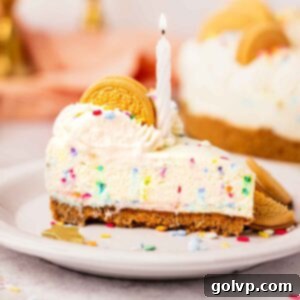funfetti cheesecake slice with lit candle square