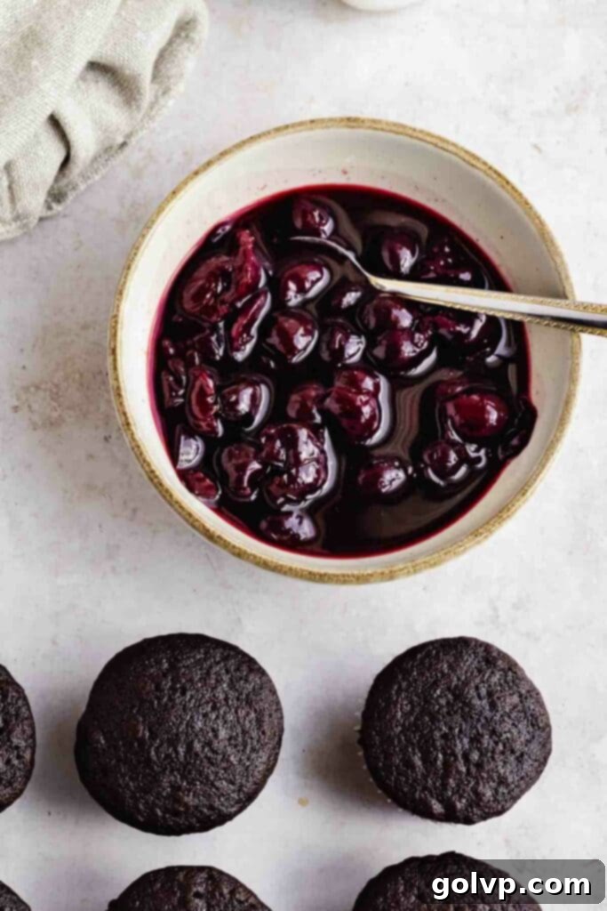 Decadent Black Forest Cupcakes 6 Prepared cherry filling, rich and thick, in a glass container