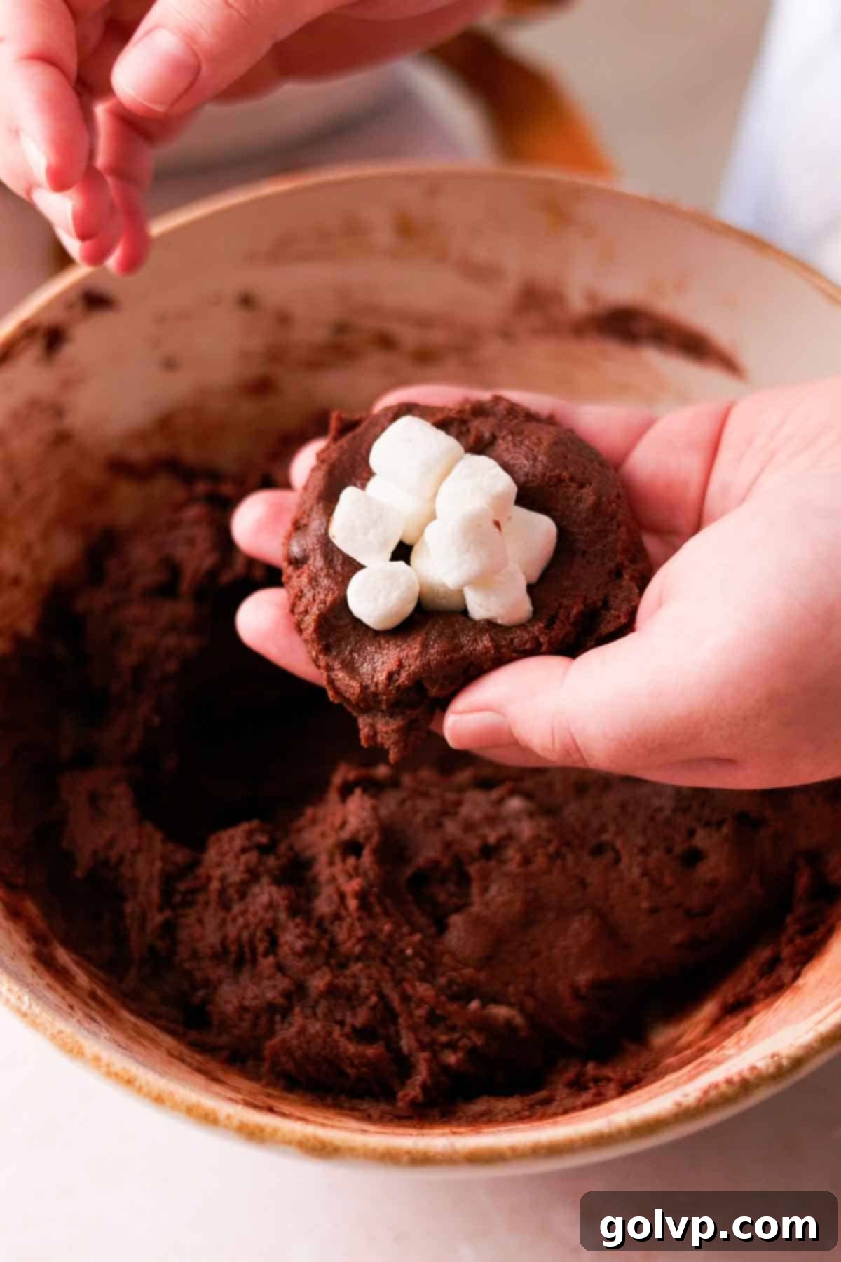 filling cookie dough with mini marshmallows