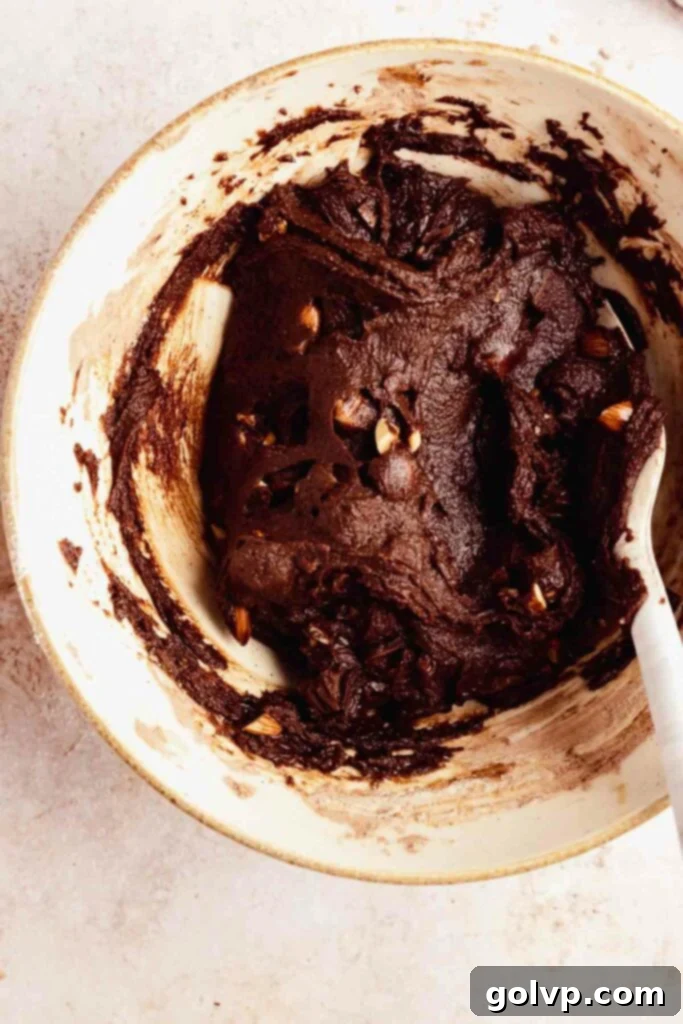 The prepared chocolate cookie dough with almonds and chocolate