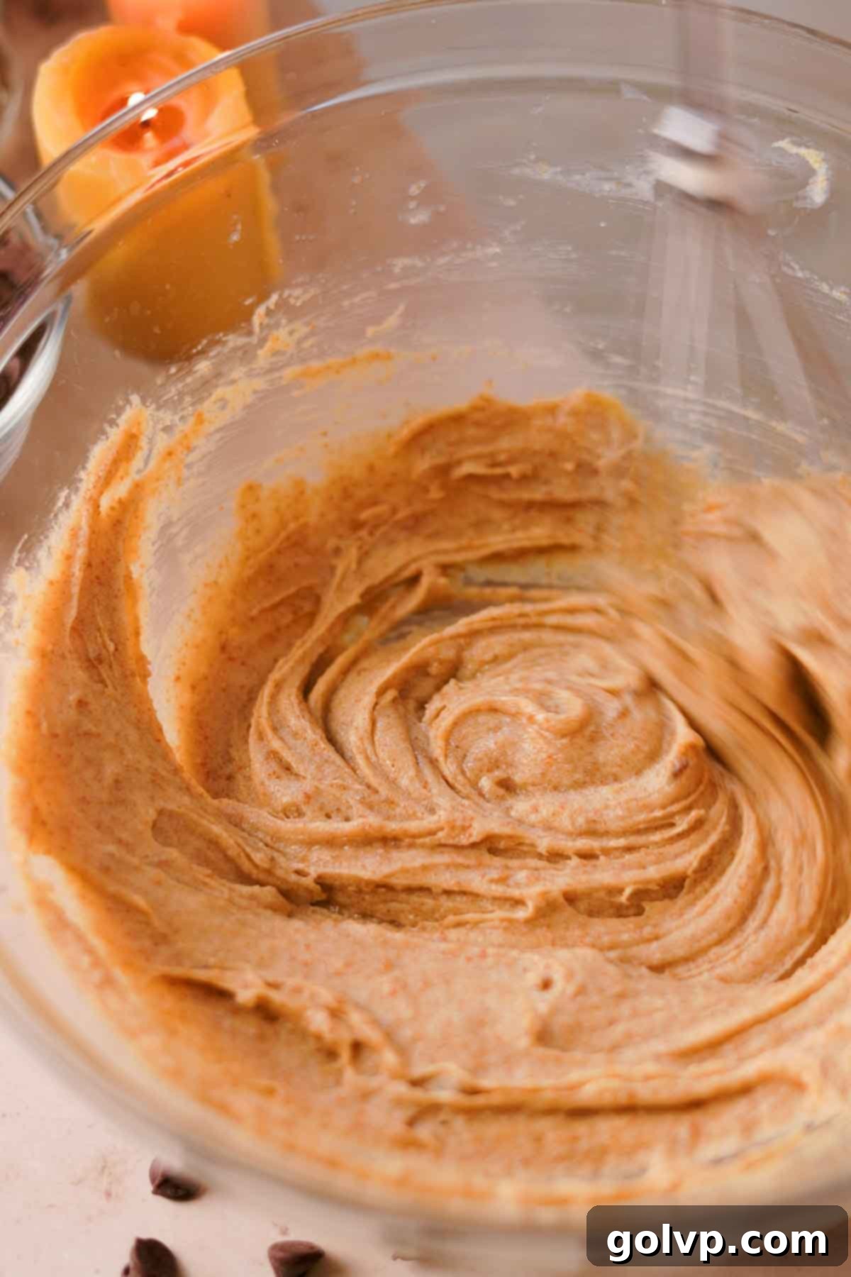 Heavenly Toffee Cookies: Our Foolproof Homemade Toffee Secret 13 whisking egg into creamed butter and sugar in large glass bowl