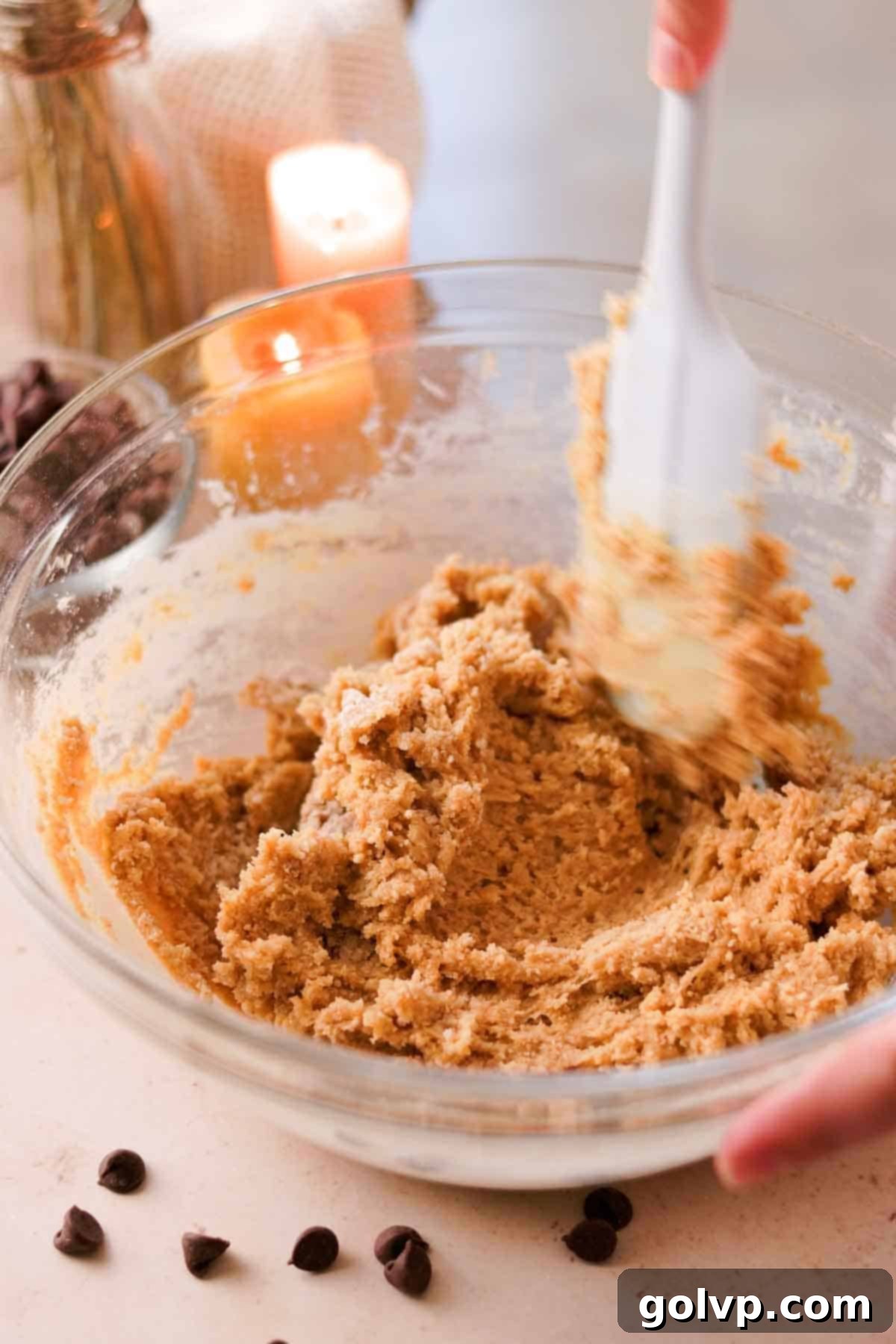 Heavenly Toffee Cookies: Our Foolproof Homemade Toffee Secret 15 folding flour into wet ingredients with rubber spatula