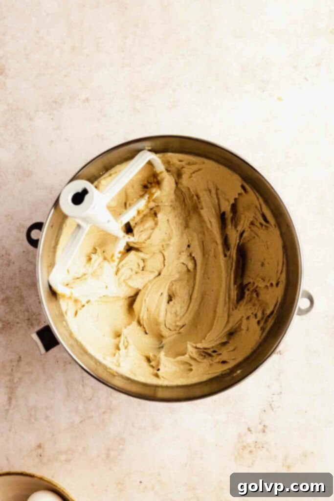 beaten butter, oil, and sugar until fluffy
