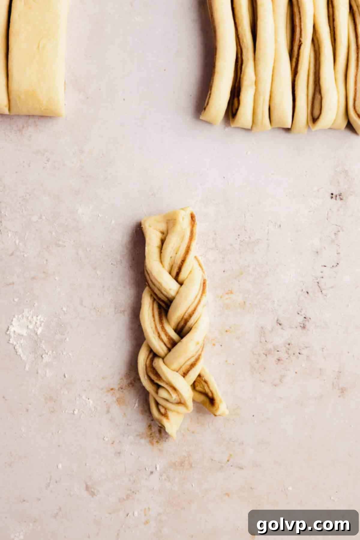 Cinnamon Swirl Delights 8 Braiding and twisting individual cinnamon roll strips