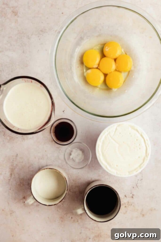 Ingredients for the tiramisu filling laid out before mixing, highlighting fresh eggs, sugar, and coffee.