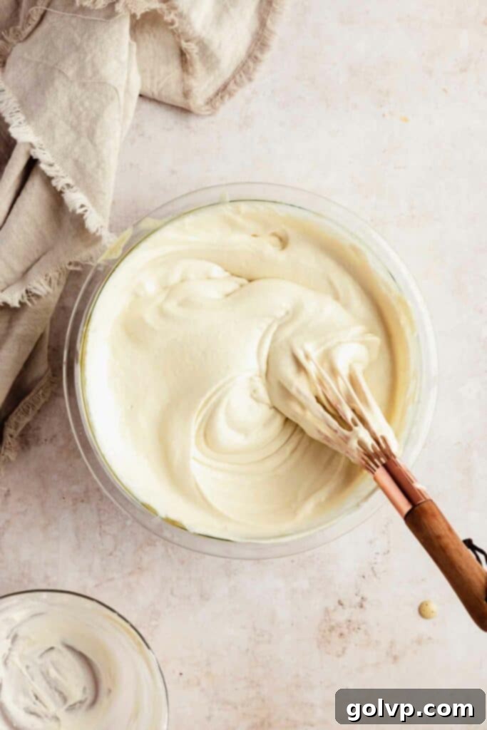 The completed, smooth, and creamy tiramisu filling, perfectly textured and ready for assembly.