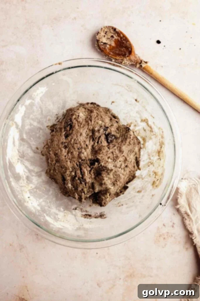 Step-by-step: No-knead Cookies and Cream dough in a bowl before its first rise.