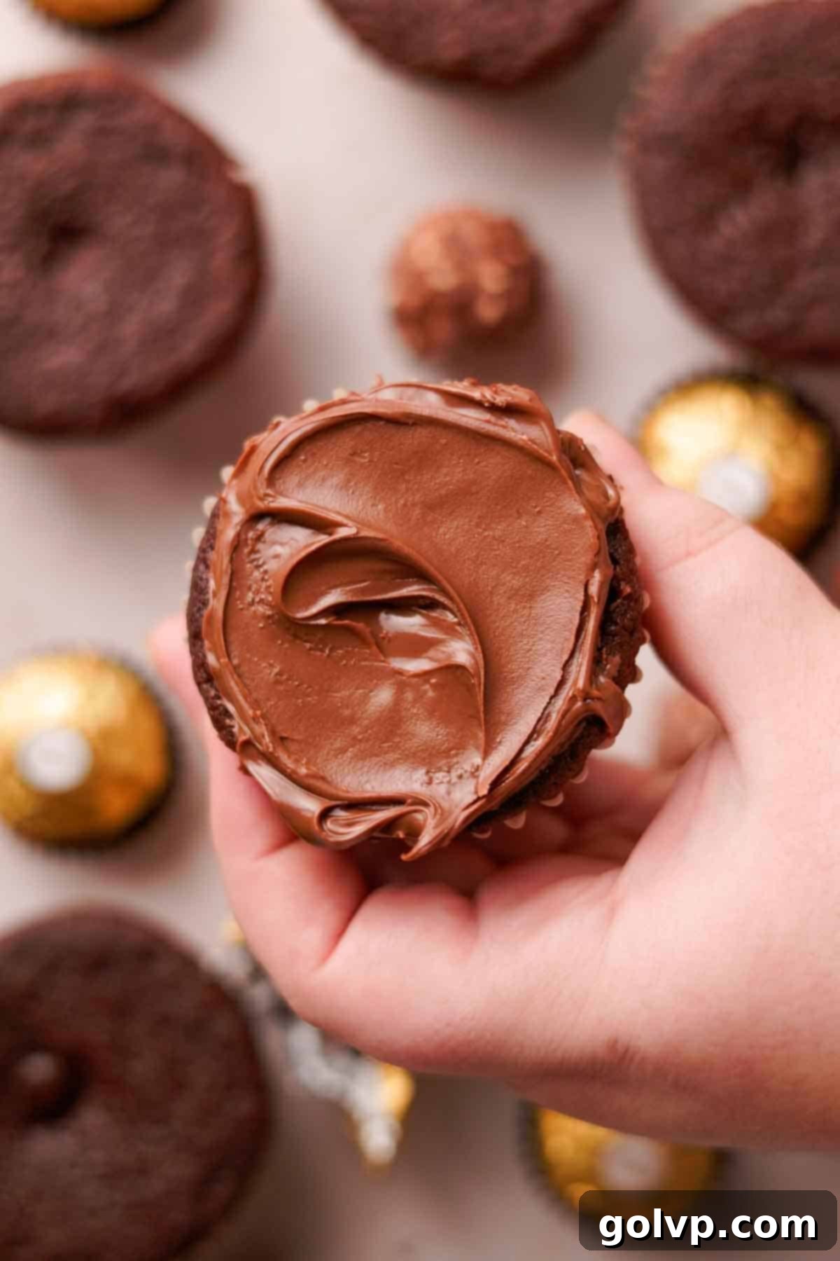 chocolate cupcake with nutella spread on top